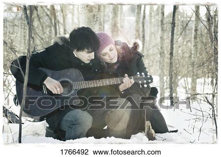 Stock Image - Man serenades woman. Fotosearch
