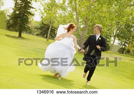 Married couple go for a run View Large Photo Image Stock Photograph - Married couple go for a run. Fotosearch