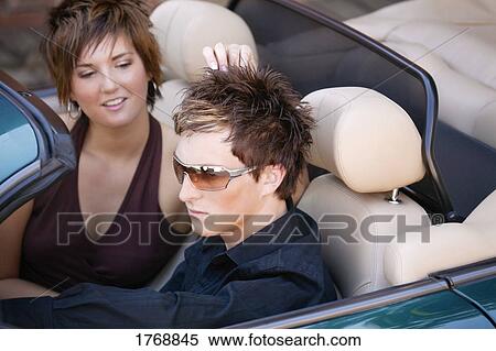 Woman plays with man's hair View Large Photo Image Stock Photography - Woman plays with man's hair. Fotosearch