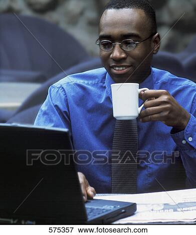 Stock Photo - A working breakfast. Fotosearch