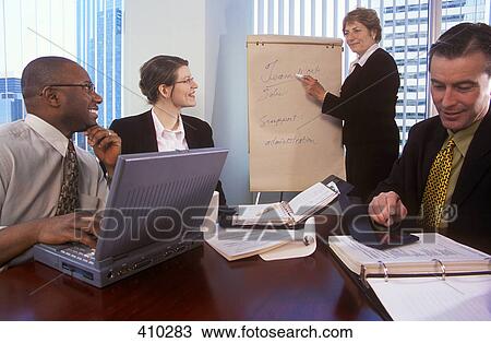 Stock Image - Business meeting success. Fotosearch