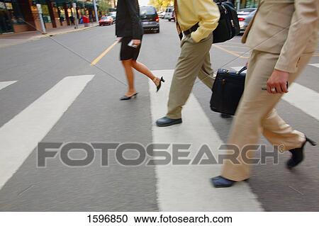 Businesspeople cross the street View Large Photo Image Stock Image - Businesspeople cross the street. Fotosearch