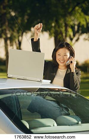 Businesswoman receives good news View Large Photo Image Stock Image - Businesswoman receives good news. Fotosearch