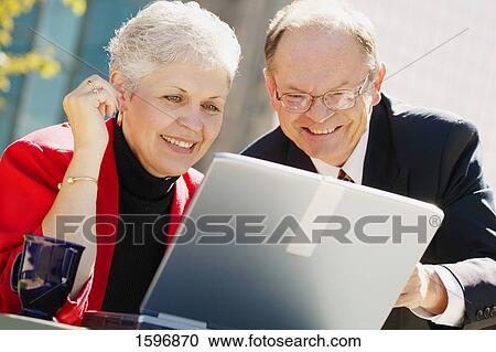 Stock Image - Reviewing results. Fotosearch