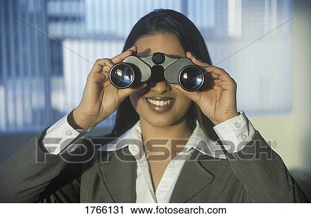 Stock Image - Woman with binoculars. Fotosearch