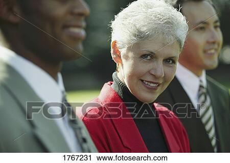 A group of businesspeople View Large Photo Image Stock Image - A group of businesspeople. Fotosearch