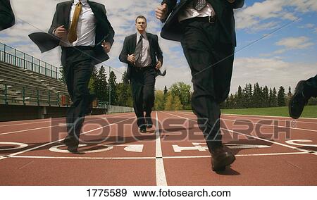 Stock Photo - A race between businessmen. Fotosearch