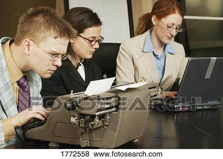 Business people working View Large Photo Image Stock Photo - Business people working. Fotosearch