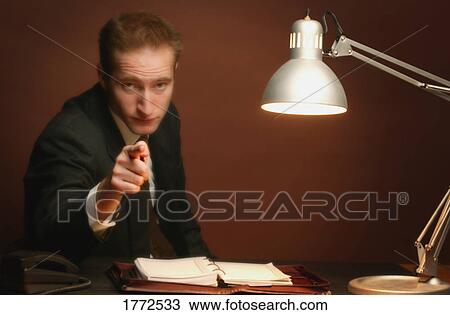 Businessman making a point View Large Photo Image Stock Image - Businessman making a point. Fotosearch