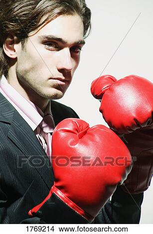 Businessman with boxing gloves View Large Photo Image Picture - Businessman with boxing gloves. Fotosearch