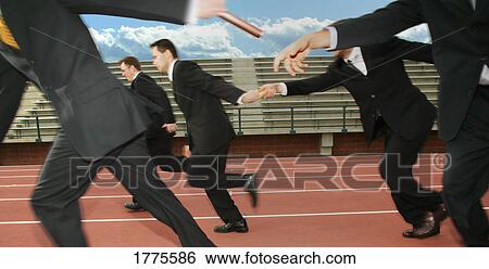 Businessmen in a relay race View Large Photo Image Stock Photograph - Businessmen in a relay race. Fotosearch