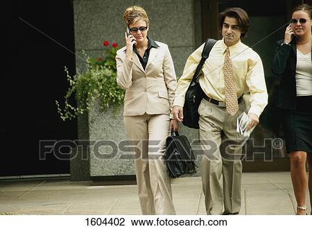 Businesspeople cross the street View Large Photo Image Stock Image - Businesspeople cross the street. Fotosearch