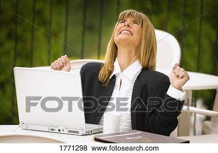 Businesswoman and laptop View Large Photo Image Stock Photo - Businesswoman and laptop. Fotosearch