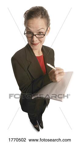 Stock Image - Businesswoman with notepad. Fotosearch