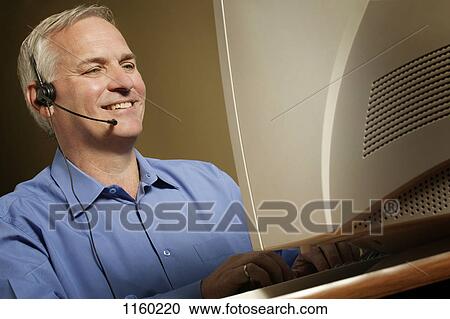 Man with headset View Large Photo Image Stock Image - Man with headset. Fotosearch