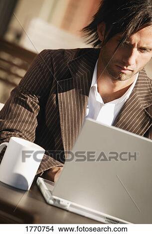Man working on computer View Large Photo Image Picture - Man working on computer. Fotosearch