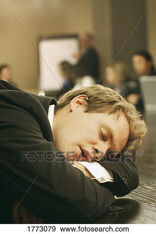Stock Photo - Overtired executive. Fotosearch