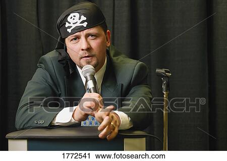 Speaker wearing pirate headgear View Large Photo Image Stock Image - Speaker wearing pirate headgear. Fotosearch