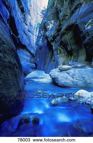 Boulder filled river at bottom of canyon View Large Photo Image Stock Image - Boulder filled river at bottom of canyon. Fotosearch