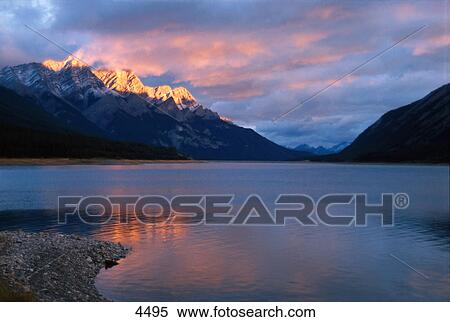 Morning light on mountain lake View Large Photo Image Stock Photography - Morning light on mountain lake. Fotosearch
