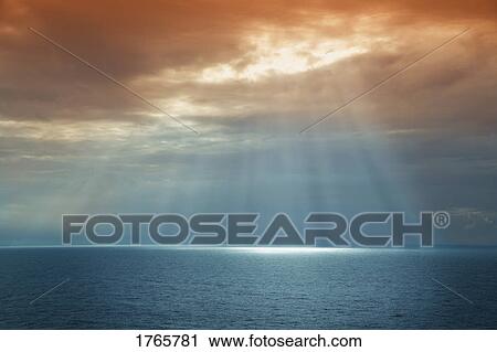 Sun breaking through the cloud View Large Photo Image Stock Image - Sun breaking through the cloud. Fotosearch