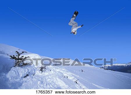Stock Photo - A snowboarder. Fotosearch