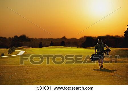 Golfing alone View Large Photo Image Stock Image - Golfing alone. Fotosearch