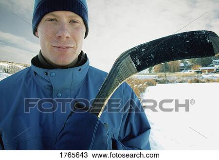 Portrait of a hockey player View Large Photo Image Stock Image - Portrait of a hockey player. Fotosearch