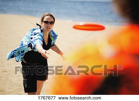 Throwing a Frisbee View Large Photo Image Stock Photo - Throwing a Frisbee. Fotosearch