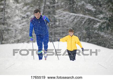 A couple of cross country skiers View Large Photo Image Stock Photo - A couple of cross country skiers. Fotosearch