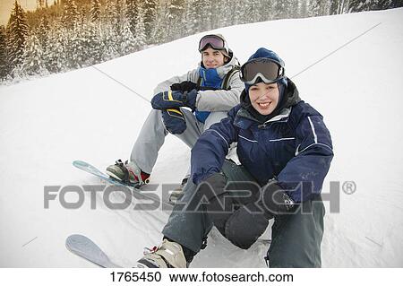 A couple of snowboarders View Large Photo Image Stock Image - A couple of snowboarders. Fotosearch