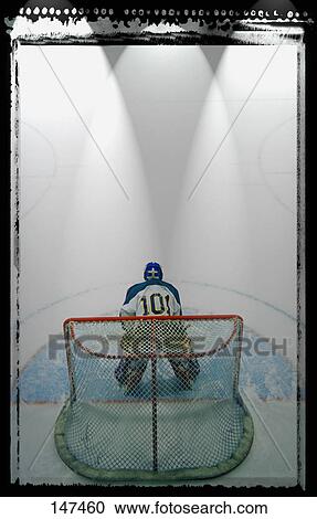 Hockey goalie in crease View Large Photo Image Stock Image - Hockey goalie in crease. Fotosearch