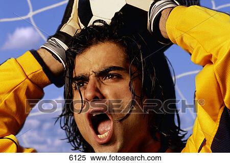Soccer goalkeeper with ball View Large Photo Image Stock Photography - Soccer goalkeeper with ball. Fotosearch