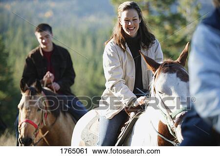 Stock Image - Trail riding. Fotosearch