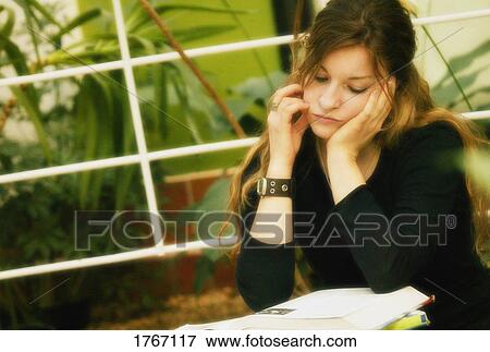 A student studies View Large Photo Image Stock Photo - A student studies. Fotosearch