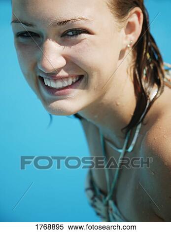 Stock Photography - A teenager with wet hair. Fotosearch