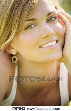 Stock Image - Closeup of woman's face. Fotosearch