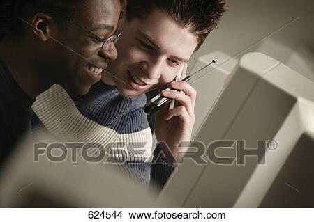 Picture - On the phone. Fotosearch