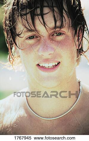 Portrait of a young man's face View Large Photo Image Stock Photography - Portrait of a young man's face. Fotosearch
