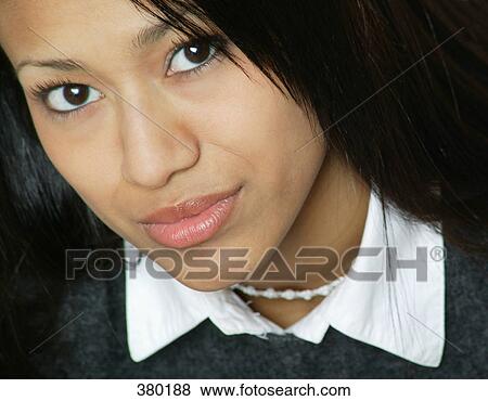 Stock Photo - Portrait of woman's face (closeup). Fotosearch