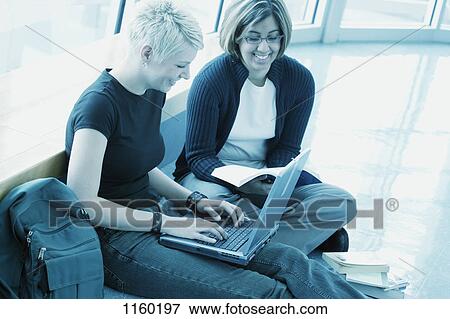 Students with lap top computer View Large Photo Image Stock Photo - Students with lap top computer. Fotosearch