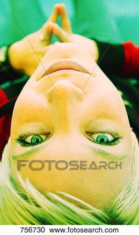 Stock Image - Teenager upside down. Fotosearch