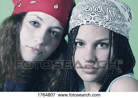 Two girls with bandannas View Large Photo Image Stock Photo - Two girls with bandannas. Fotosearch