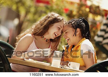 Two teenage girls have tea View Large Photo Image Stock Image - Two teenage girls have tea. Fotosearch