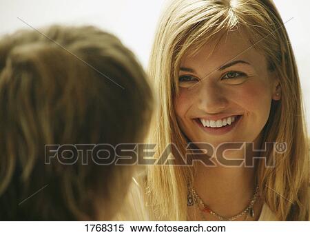 Woman smiles View Large Photo Image Stock Photography - Woman smiles. Fotosearch