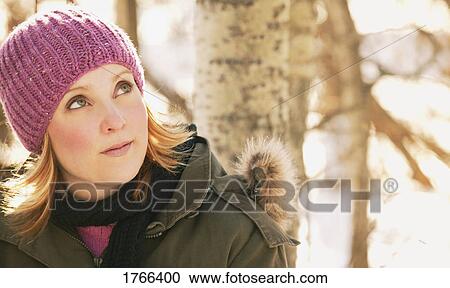Woman with pink hat View Large Photo Image Stock Image - Woman with pink hat. Fotosearch