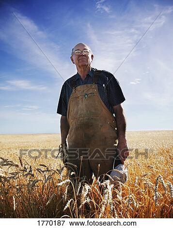Stock Photo - A proud farmer. Fotosearch