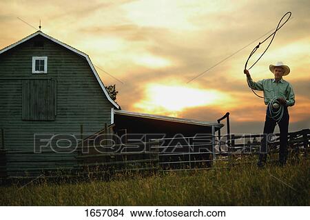 Cowboy with lasso View Large Photo Image Picture - Cowboy with lasso. Fotosearch
