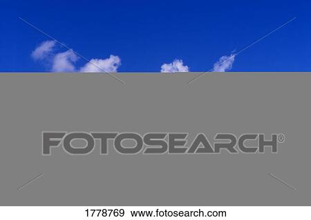 Stock Photo - Fluffy clouds. Fotosearch