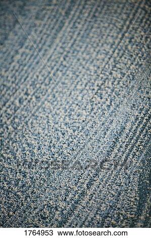 Stock Image - Raked sand in a bunker. Fotosearch